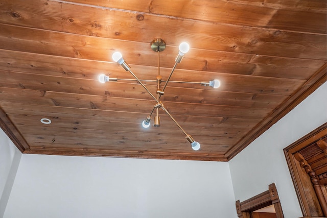 interior details with wood ceiling and crown molding