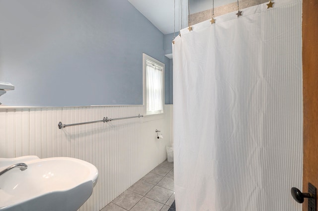 bathroom featuring tile patterned floors and sink