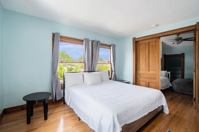 bedroom with wood-type flooring