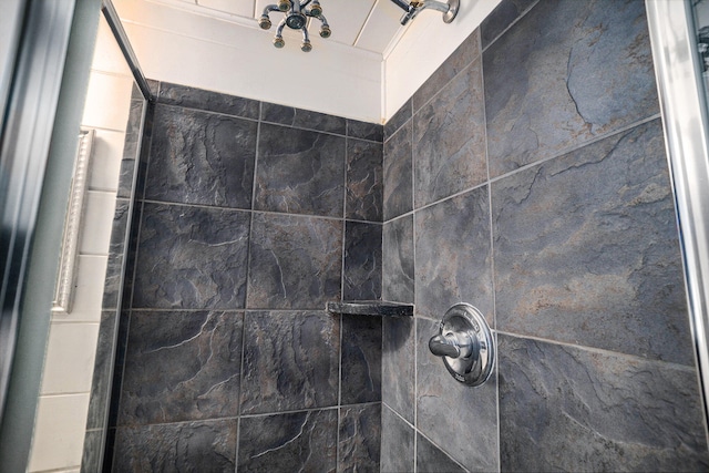 details with a tile shower