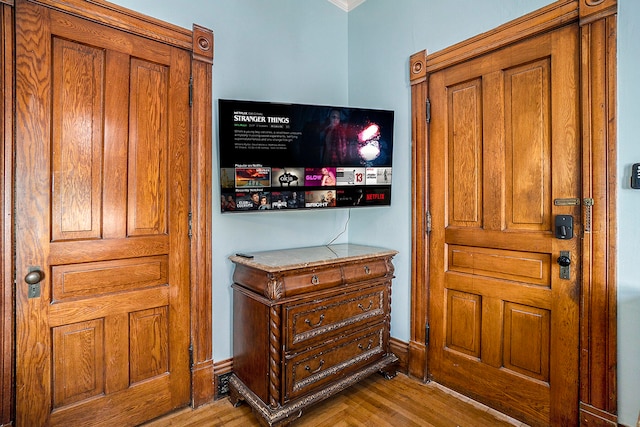 foyer entrance with light wood-type flooring