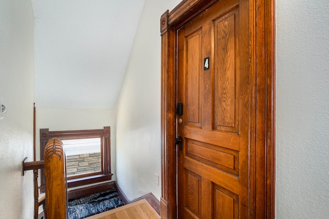 interior space featuring vaulted ceiling