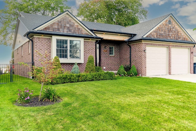 view of front of house featuring a front yard, driveway, a garage, and fence