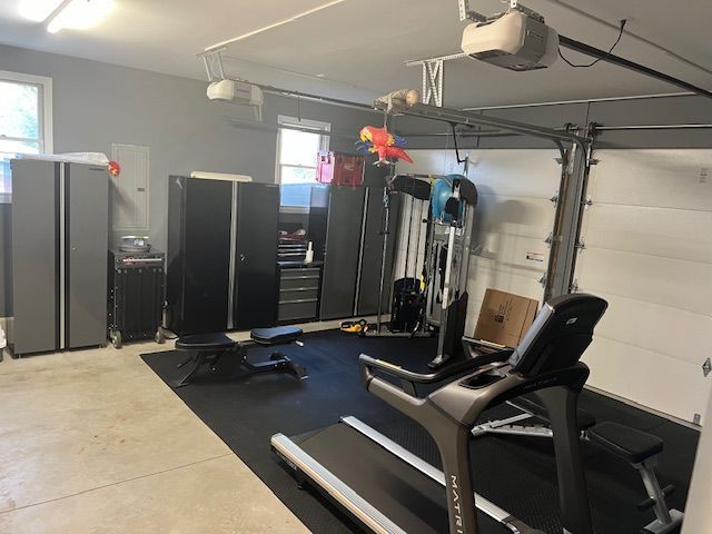 workout room with a garage