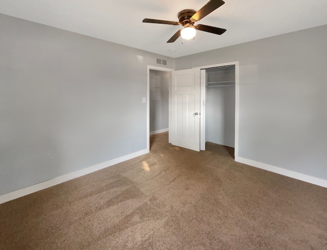 unfurnished bedroom with carpet floors, a closet, and ceiling fan