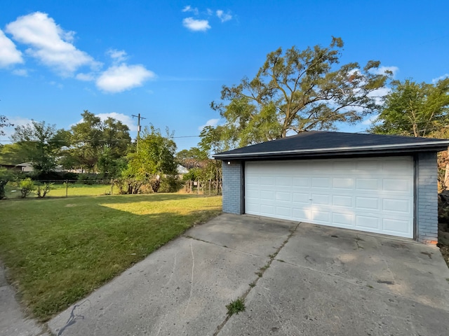 garage with a lawn