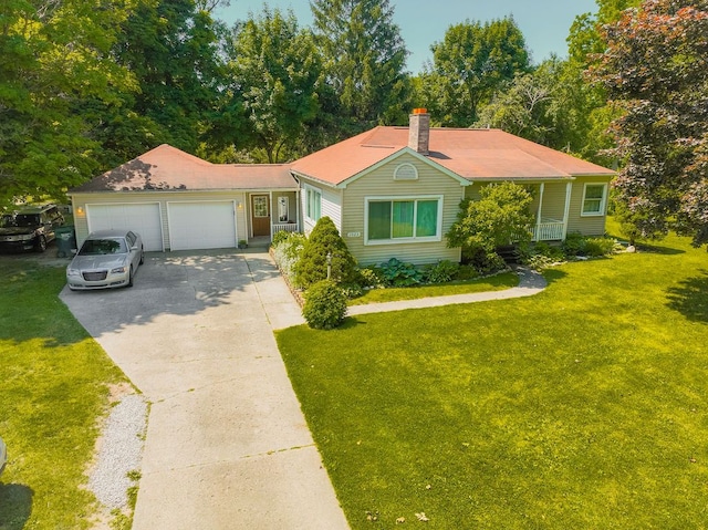 single story home featuring a front yard and a garage