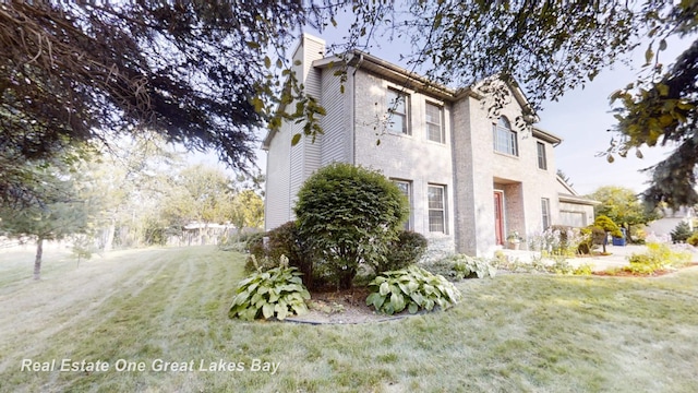 view of home's exterior featuring a yard