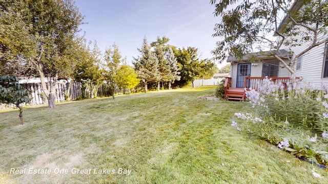 view of yard featuring a deck