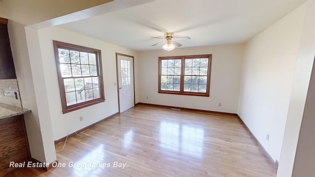 interior space featuring ceiling fan and light hardwood / wood-style flooring