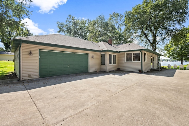 ranch-style house featuring a garage