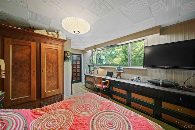 bedroom featuring light colored carpet