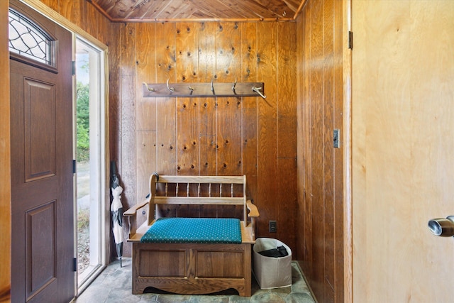 interior space featuring wooden walls and wood ceiling