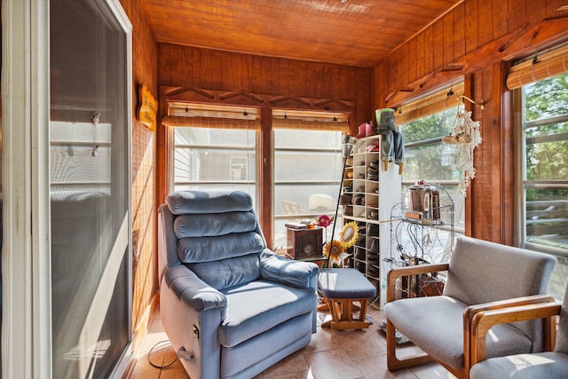 sunroom featuring wood ceiling