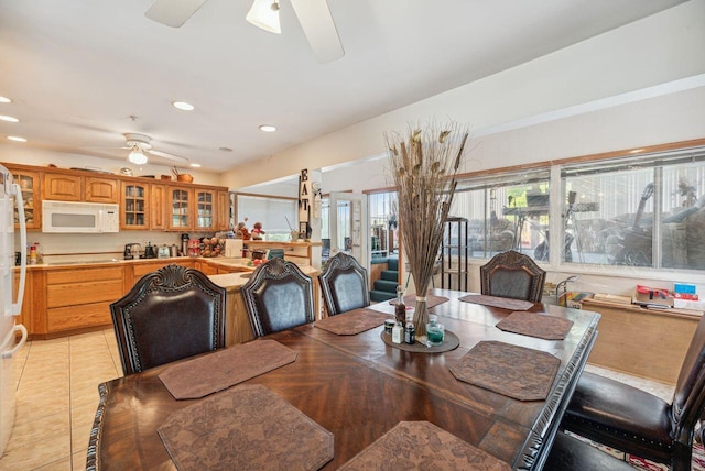 5563 Spring Creek Rd, Three Oaks, MI 49128 - dining room featuring ceiling fan, recessed lighting, and light tile patterned floors