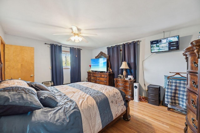 5563 Spring Creek Rd, Three Oaks, MI 49128 - bedroom with wood finished floors and a ceiling fan