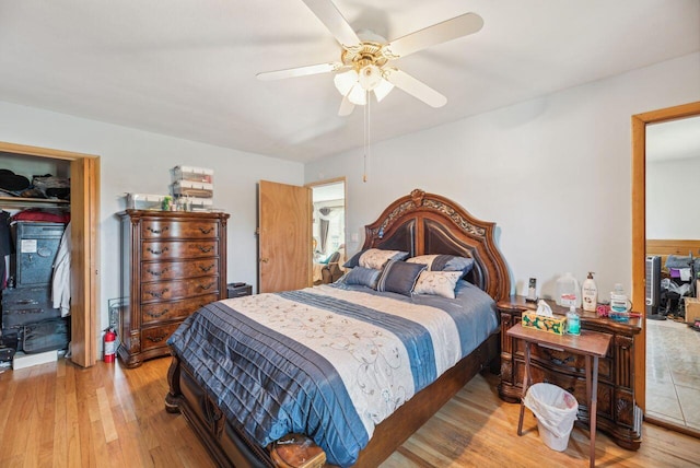 5563 Spring Creek Rd, Three Oaks, MI 49128 - bedroom featuring wood finished floors, ceiling fan, and a closet