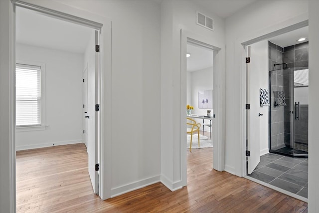 hallway featuring hardwood / wood-style floors