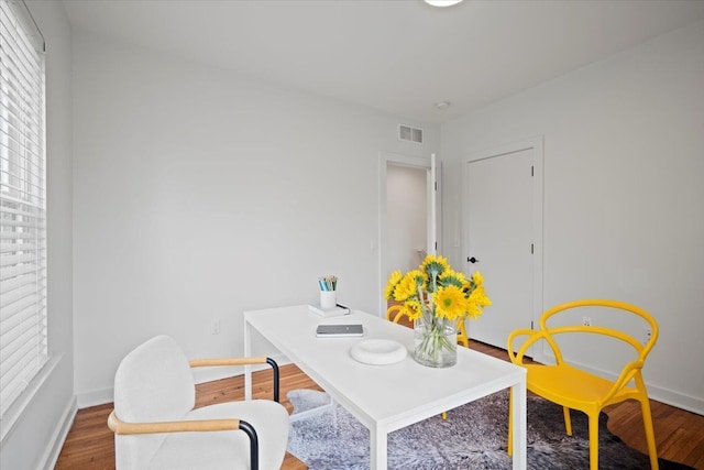 office area with hardwood / wood-style floors