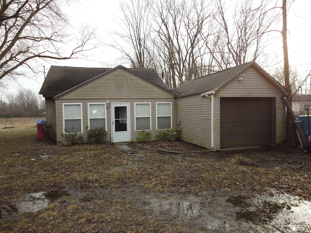 ranch-style house featuring a garage