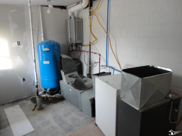 utilities with washer / clothes dryer and tankless water heater