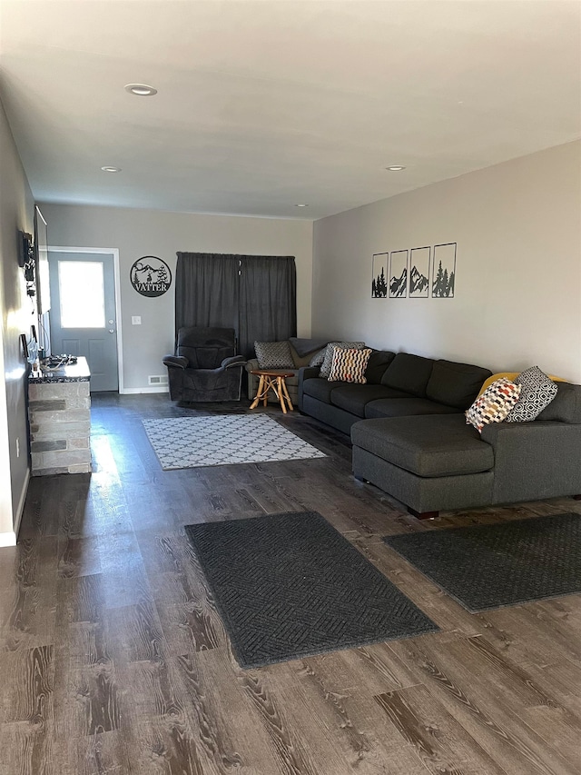 living room featuring dark hardwood / wood-style floors