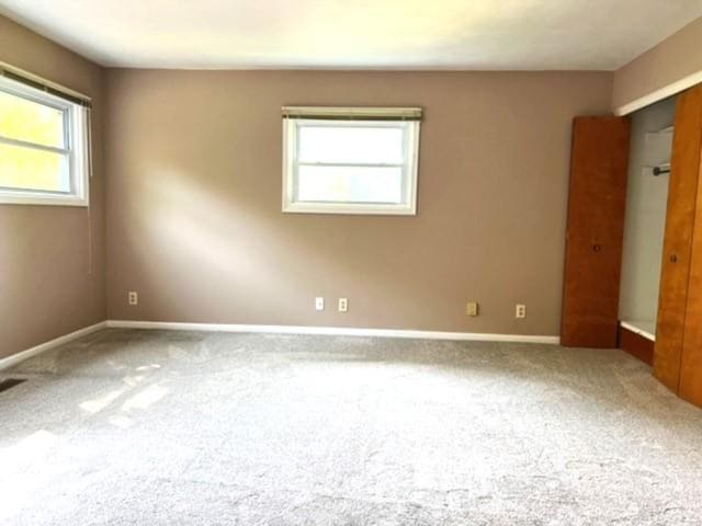 view of carpeted spare room