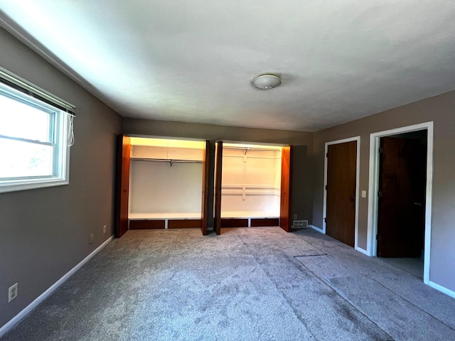 unfurnished bedroom with carpet