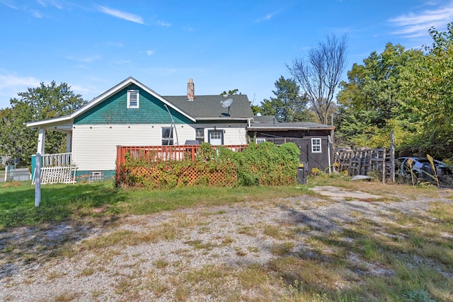 rear view of house with a deck