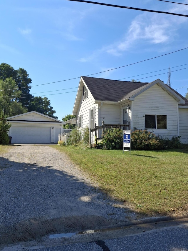 view of side of home with a yard