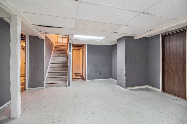 basement with a drop ceiling