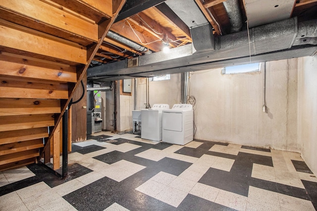 basement with washer and clothes dryer