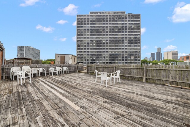 1395 Antietam Ave Unit 57, Detroit, MI 48207 - wooden terrace featuring a view of city