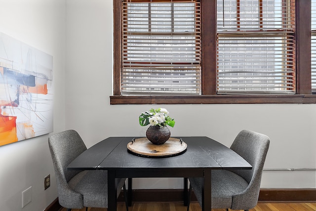 dining area featuring hardwood / wood-style floors