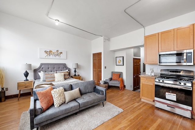 bedroom with light wood-type flooring