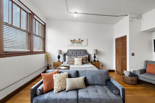 1395 Antietam Ave Unit 57, Detroit, MI 48207 - bedroom featuring wood finished floors