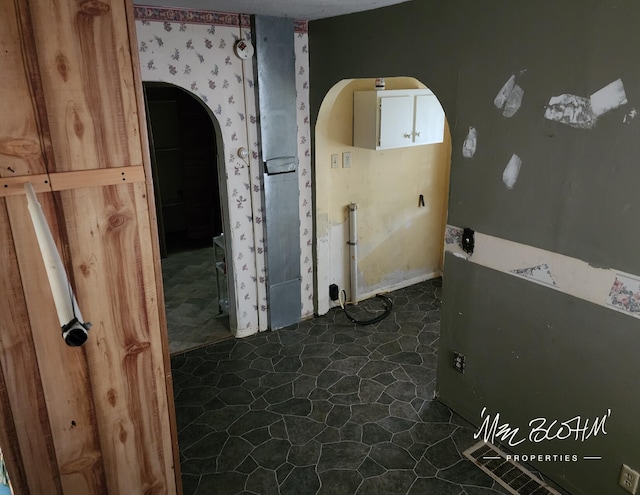 19136 130th Ave, Tustin, MI 49688 - unfurnished room featuring arched walkways