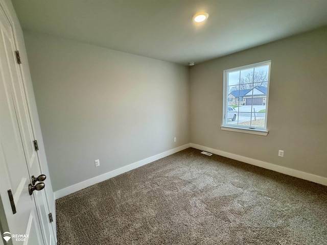 view of carpeted spare room