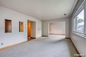 527 E University Dr Unit 1108, Rochester, MI 48307 - carpeted empty room with baseboards