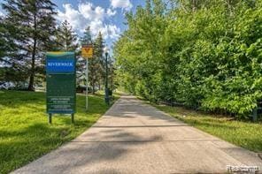 527 E University Dr Unit 1108, Rochester, MI 48307 - view of property's community with a yard
