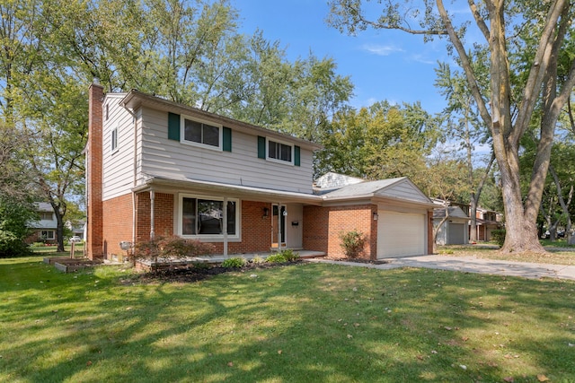 front of property featuring a front yard and a garage