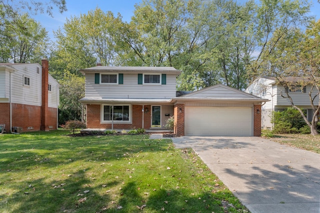 front facade with a front lawn and a garage