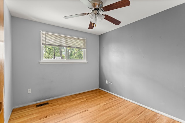 unfurnished room featuring ceiling fan and light wood-type flooring