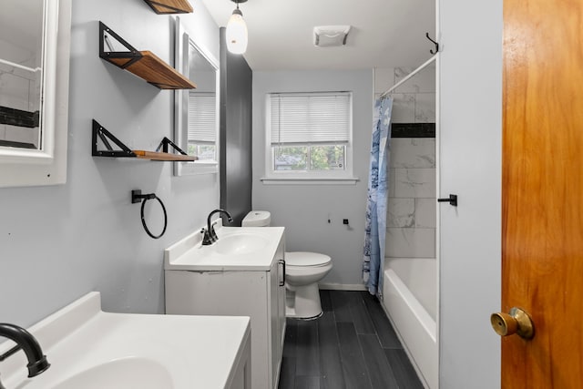 full bathroom with shower / tub combo, vanity, hardwood / wood-style flooring, and toilet