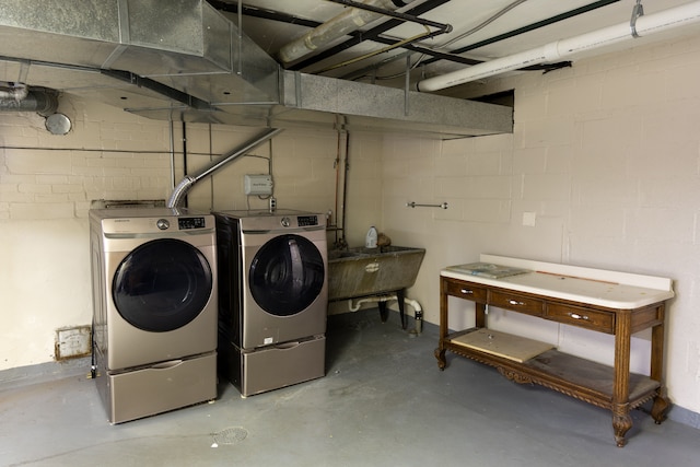 laundry area with washer and clothes dryer