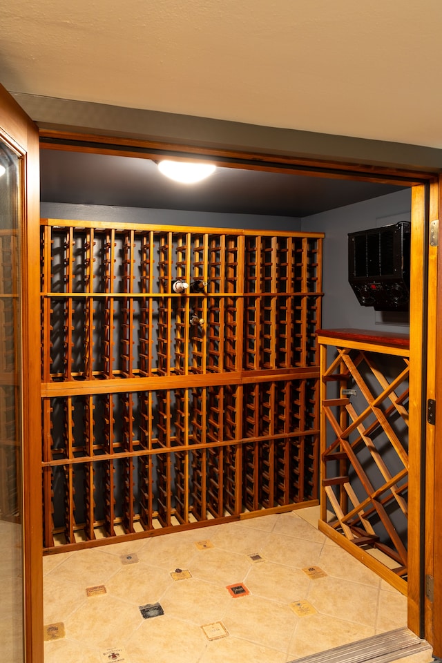 wine area with tile patterned flooring