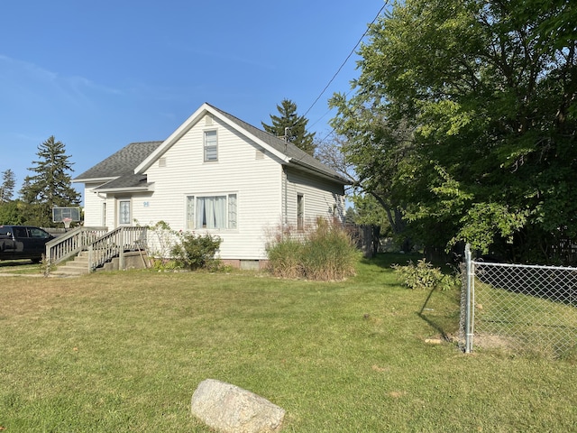 96 Harold St, Grant, MI 49327 - view of side of property featuring roof with shingles