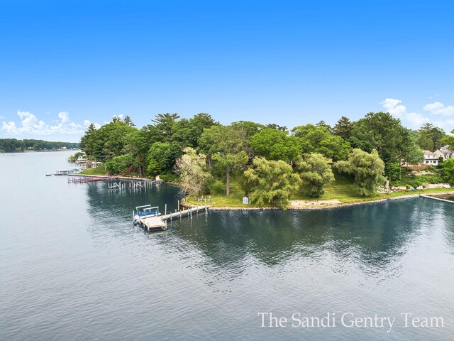 18635 N Fruitport Rd, Spring Lake, MI 49456 - water view featuring a floating dock
