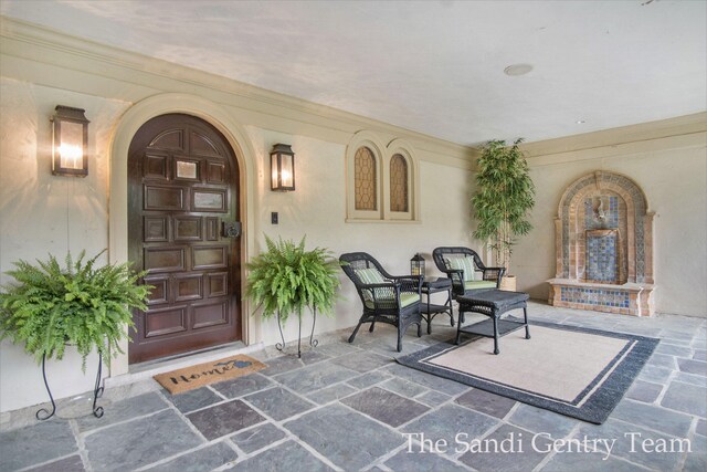 18635 N Fruitport Rd, Spring Lake, MI 49456 - entrance to property with stucco siding and covered porch