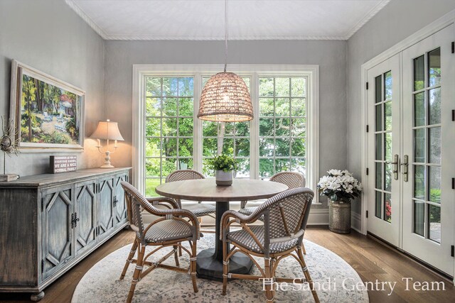 18635 N Fruitport Rd, Spring Lake, MI 49456 - dining space with crown molding, dark wood finished floors, and french doors